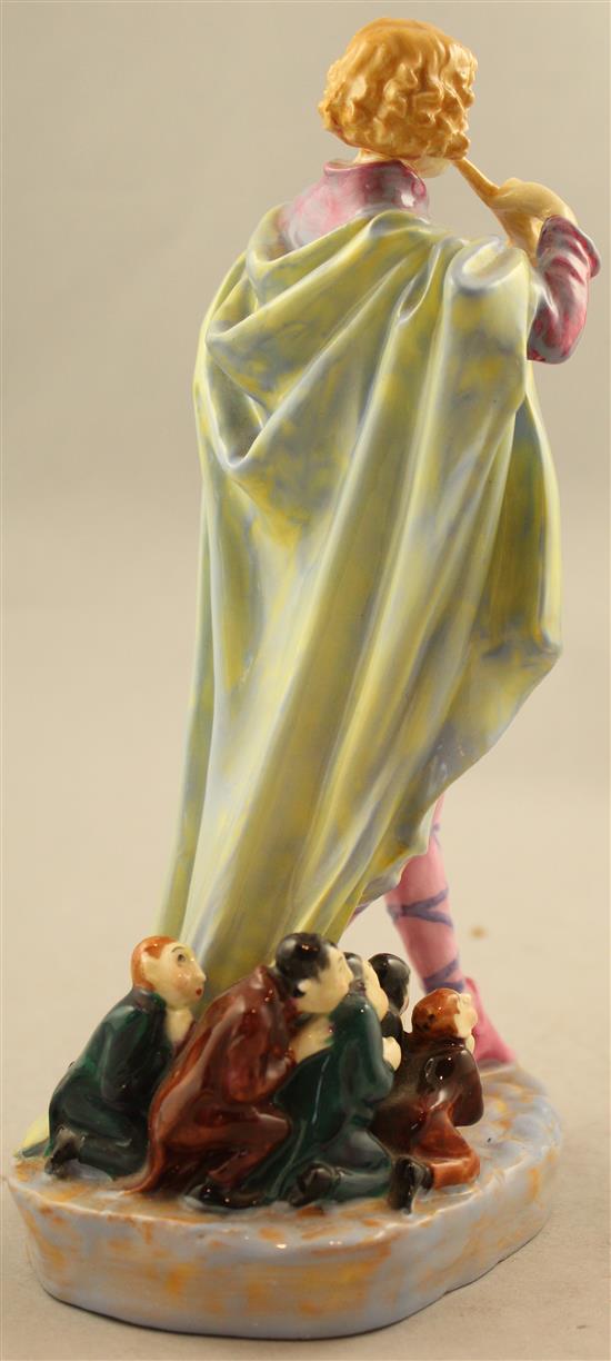 A Royal Doulton group The Modern Piper, c.1932, 22cm